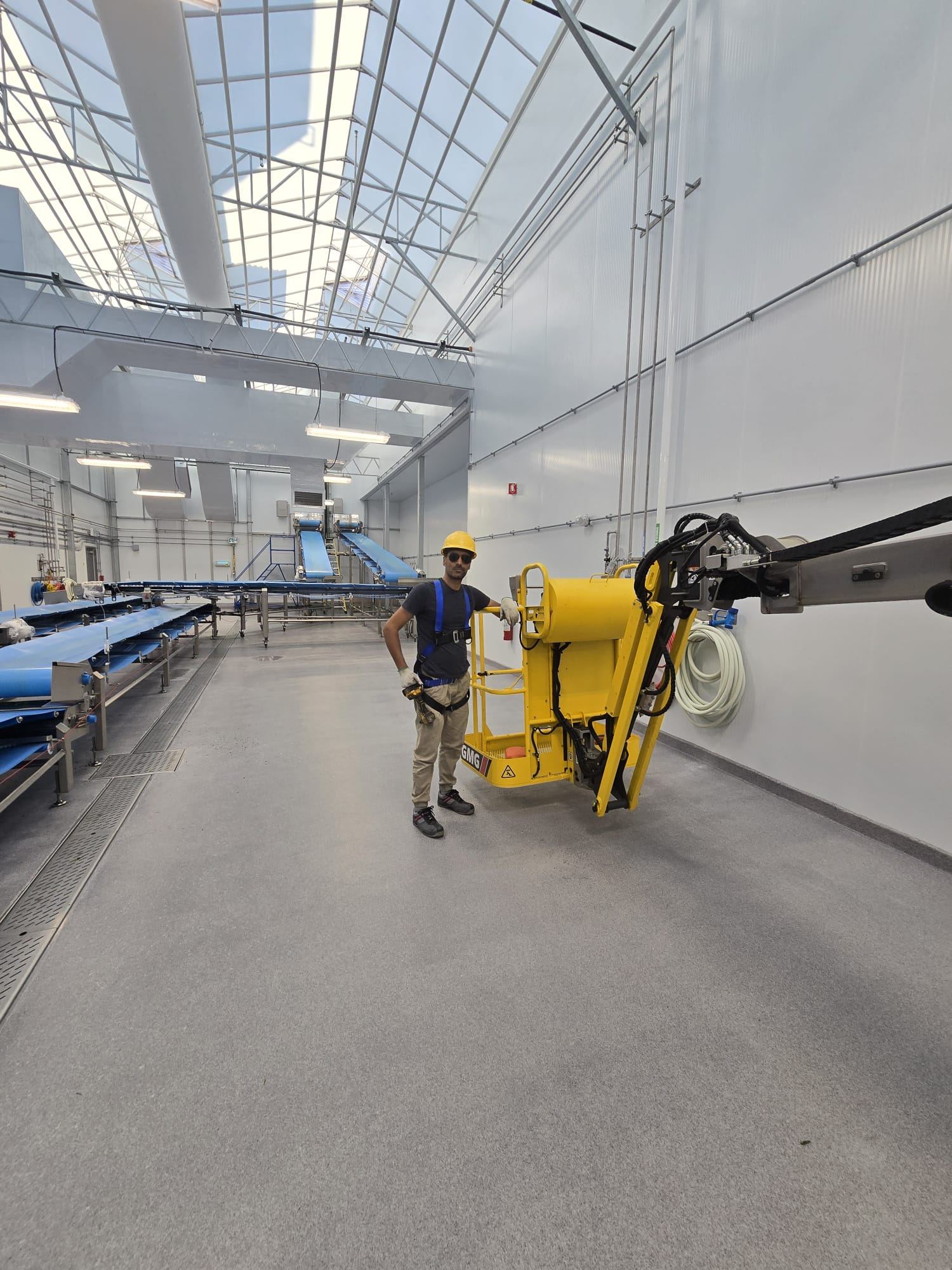 Industrial interior of a renovated greenhouse packing facility