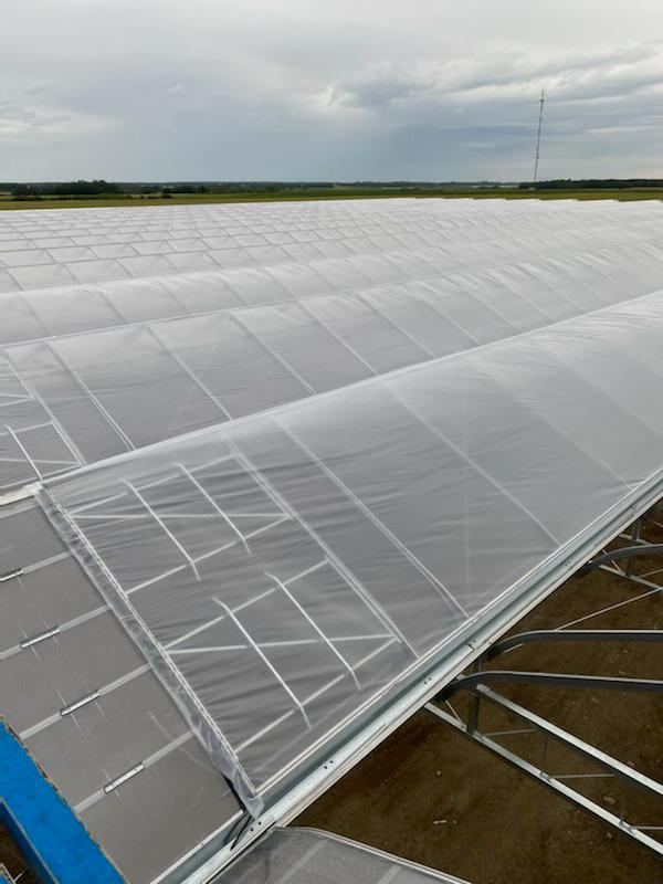 Panoramic view of a completed poly roof covering